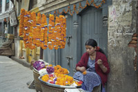 Girl Lacing Flowers in Kathmandu, Nepal