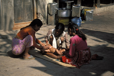 Women Washing a Baby in Kathmandu, Nepal